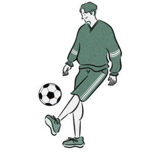 サッカーする男性