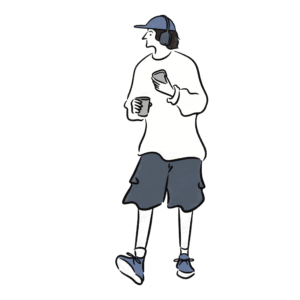 コーヒーを片手にチルする青年